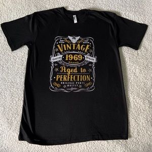 NWOT “Vintage 1969 Aged to Perfection” black t-shirt, size medium